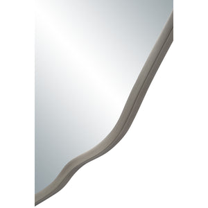 Close-up view of the Knox mirror's wavy silver frame and reflective surface.