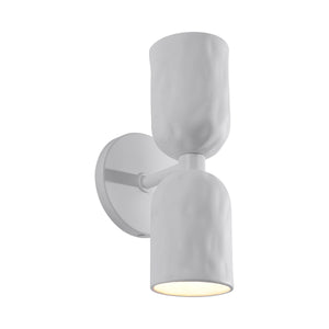 Akira Wall Sconce in white with one illuminated shade, showcasing its design