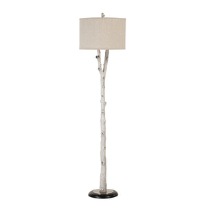Criterion floor lamp featuring a white branch-like body and a round beige lampshade
