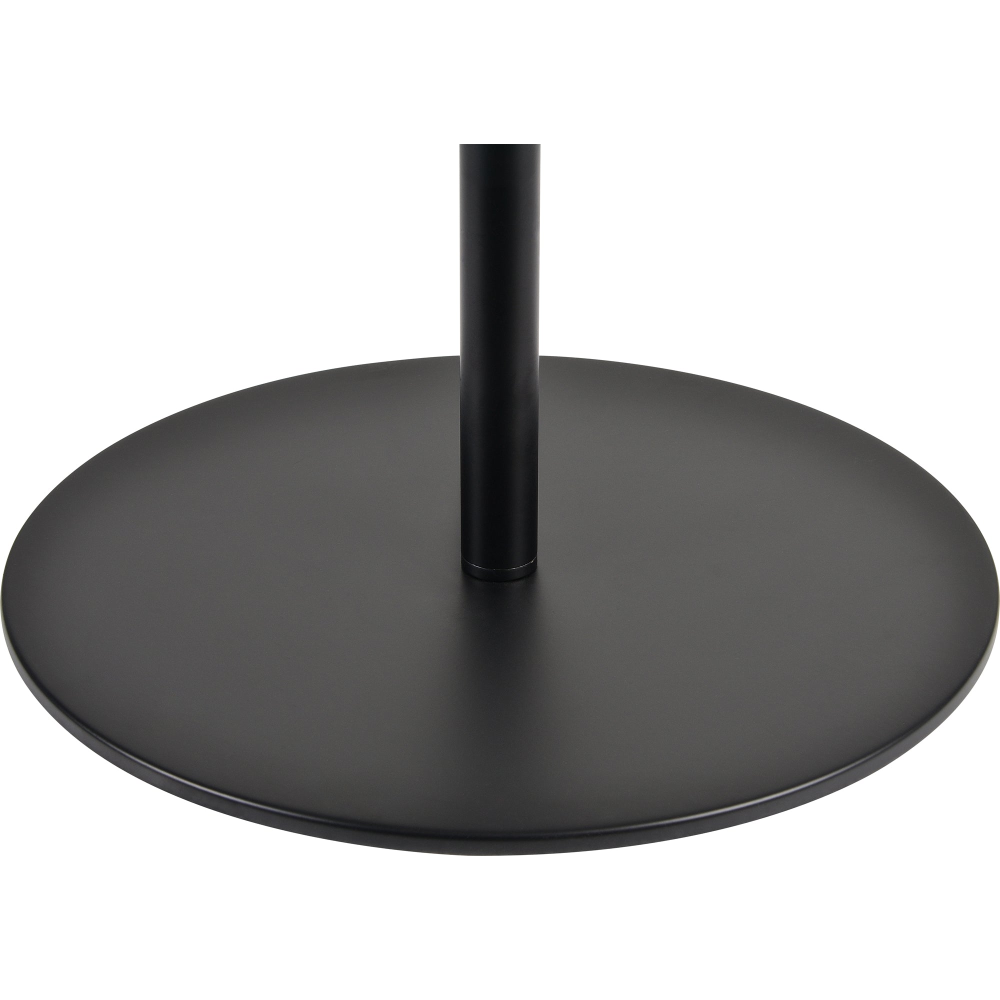 Base of Nevin Floor Lamp featuring a round black metal design.