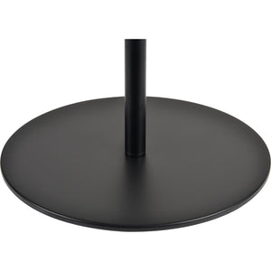 Base of Nevin Floor Lamp featuring a round black metal design.