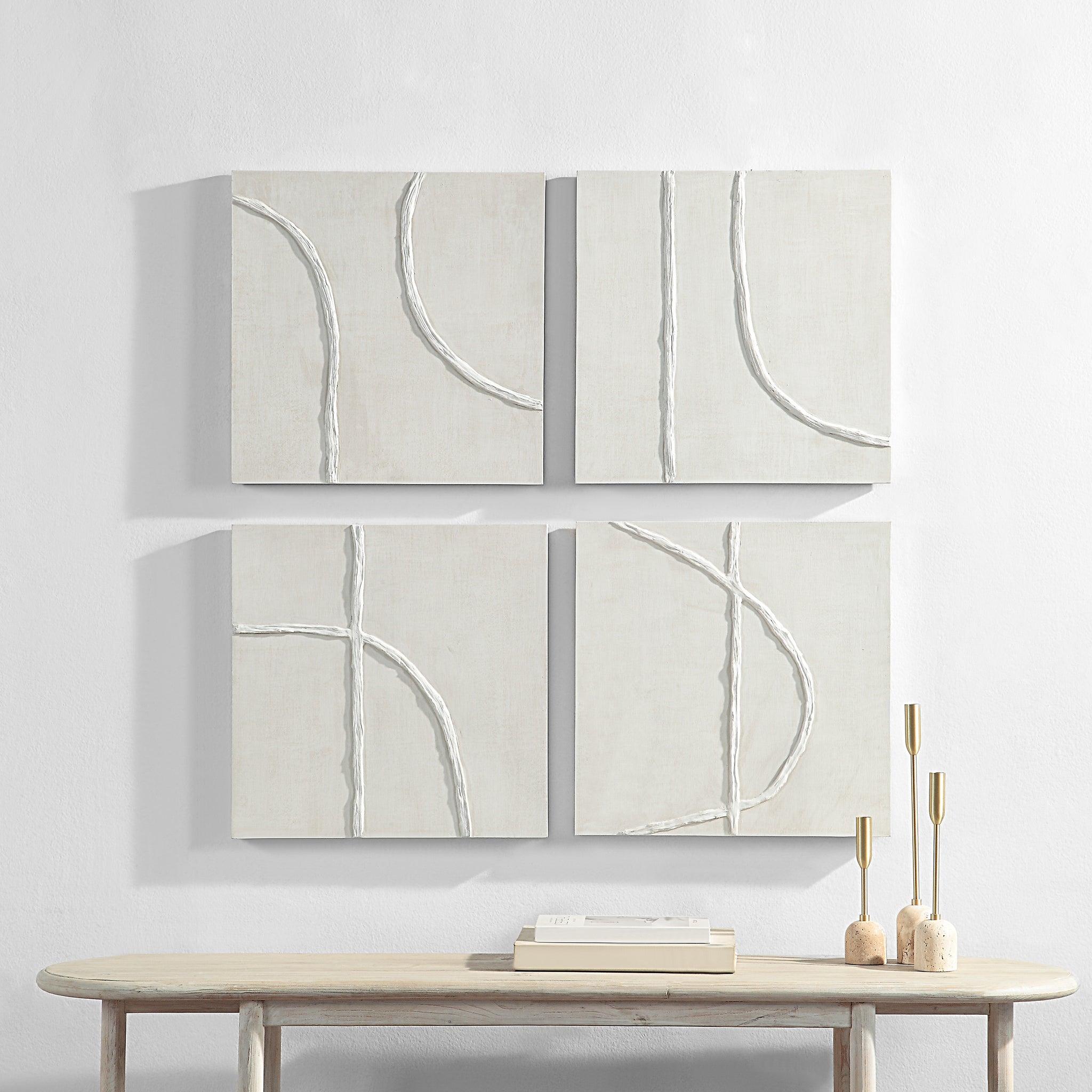 Cellier artwork displayed on a wall above a wooden table with decorative items.