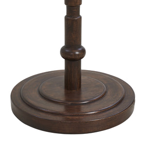 Close-up of Odlam floor lamp's dark wooden base with circular design details.