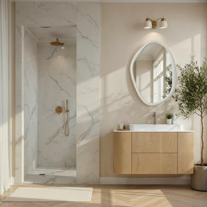 Folignio mirror in a modern bathroom with a light wood vanity, marble walls, and natural light.