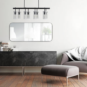 Delphinus Wall Mirror displayed above a modern black sideboard in a stylish living room