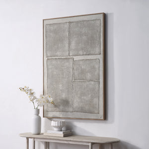 Picardy canvas art displayed on a wall above a table with decor items.
