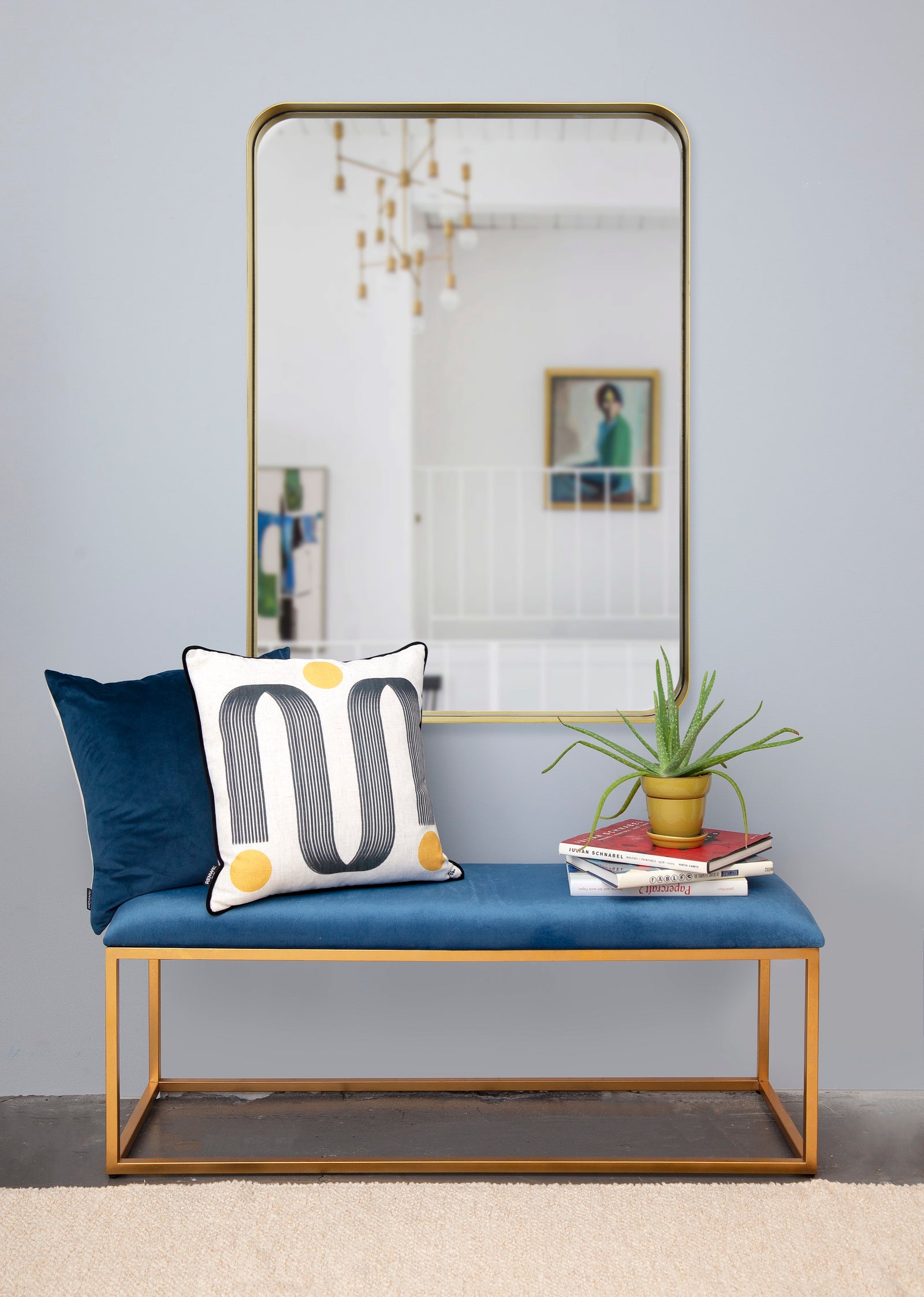 Barton Wall Mirror with a sleek gold frame and a clear reflective surface