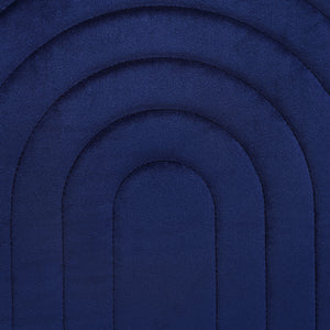 Close-up of Pichu indoor pillow featuring navy blue quilted rainbow design.