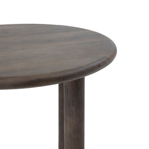 Cetus accent table featuring a round dark wood top and legs, viewed from above.