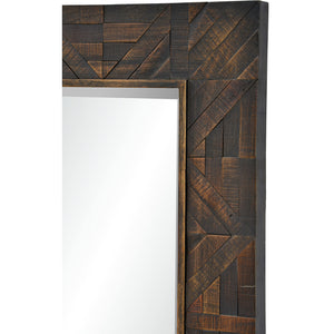 Madden Wall Mirror showcasing a detailed dark wood frame with geometric designs, angled view.