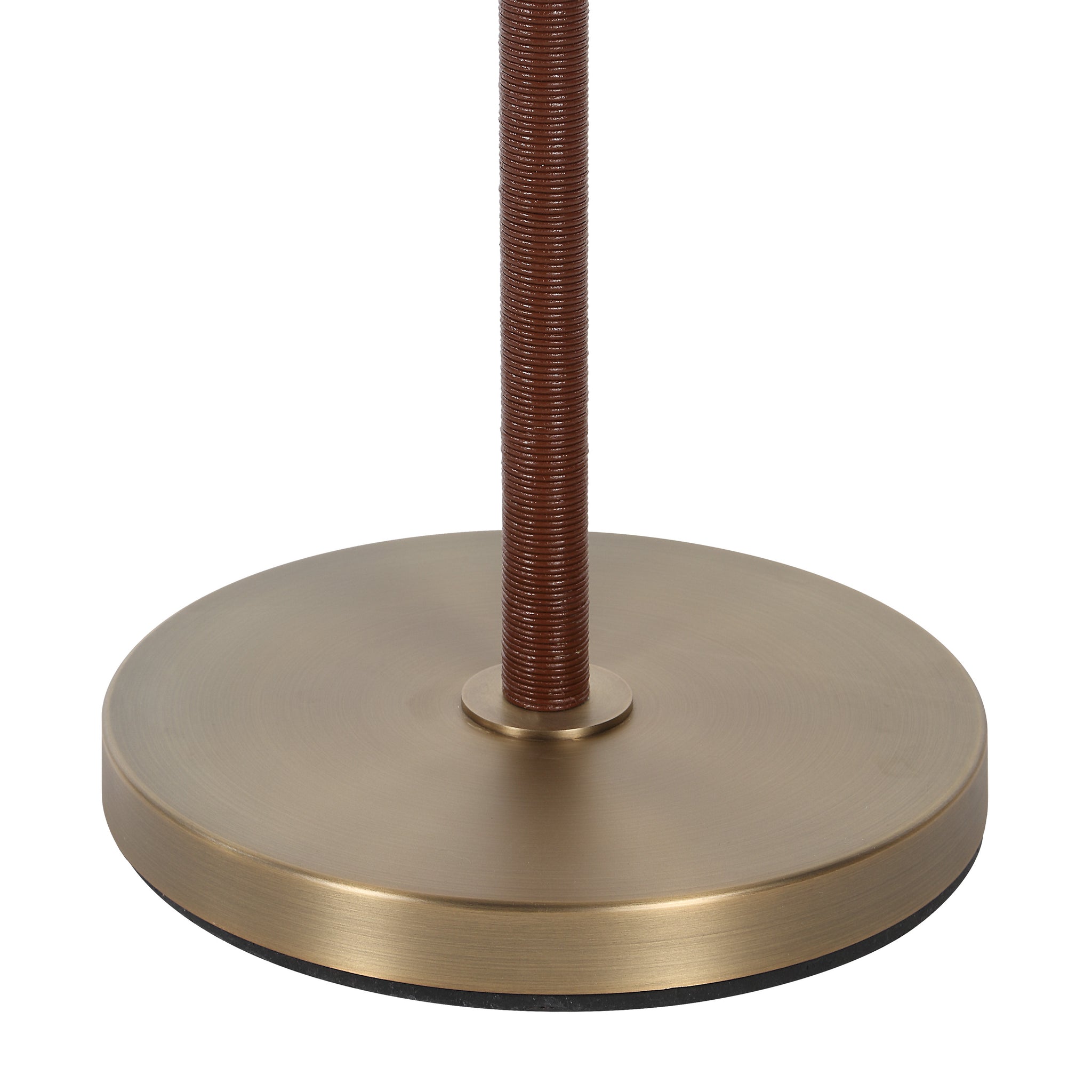 Close-up of Elea floor lamp's bronze base and textured brown stem.