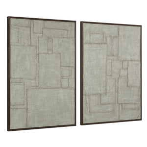Caramelo wall art showcasing two textured panels in muted gray tones with dark frames.
