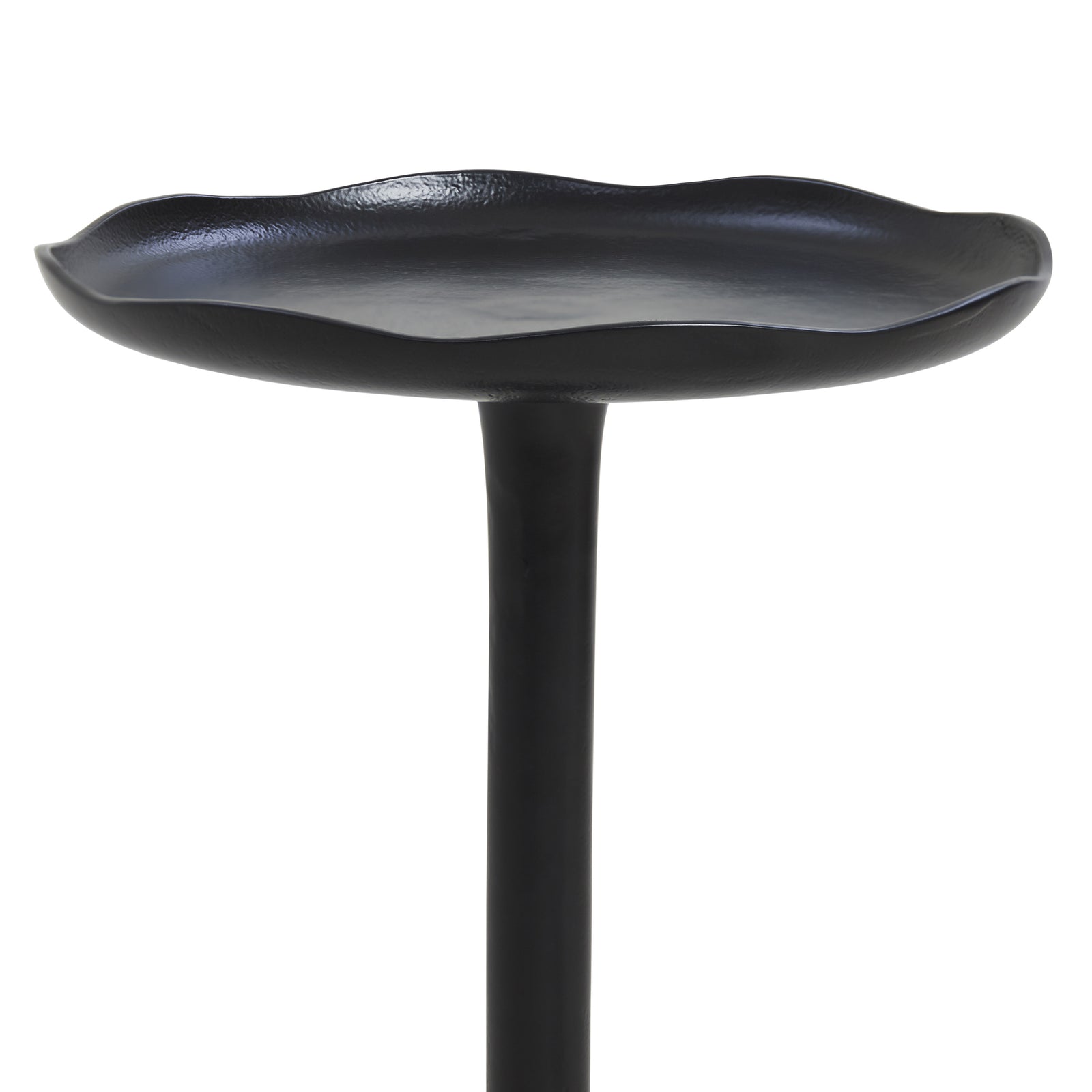 Fiora side table in black with a unique flower-shaped top and slender base.