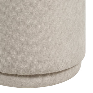 Close-up of Persea stool showcasing light beige fabric texture and rounded base.