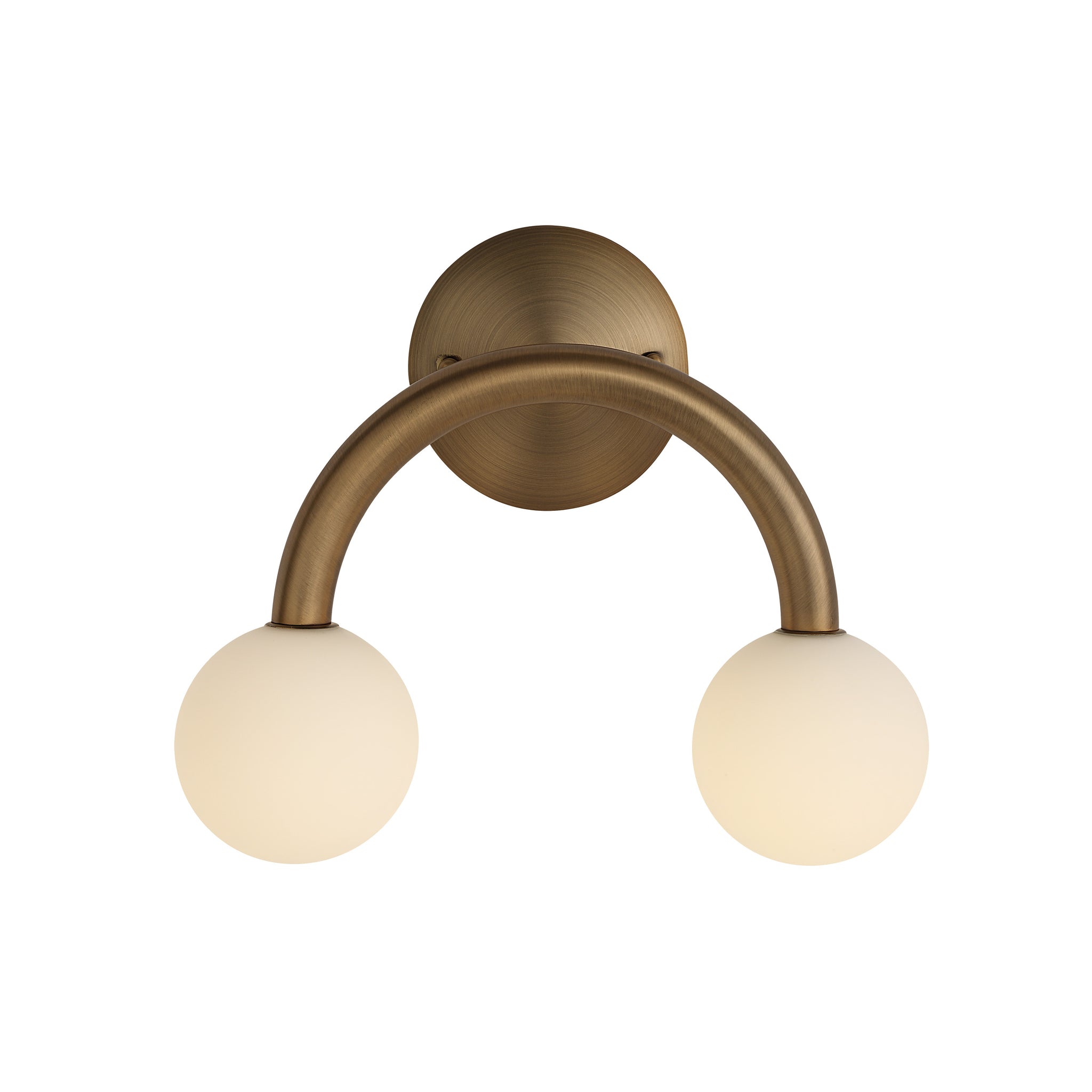 Santi wall sconce featuring a curved bronze metal arm with two frosted glass globes.