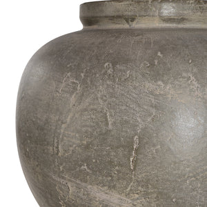 Close-up of Olivia Table Lamp's textured gray ceramic base