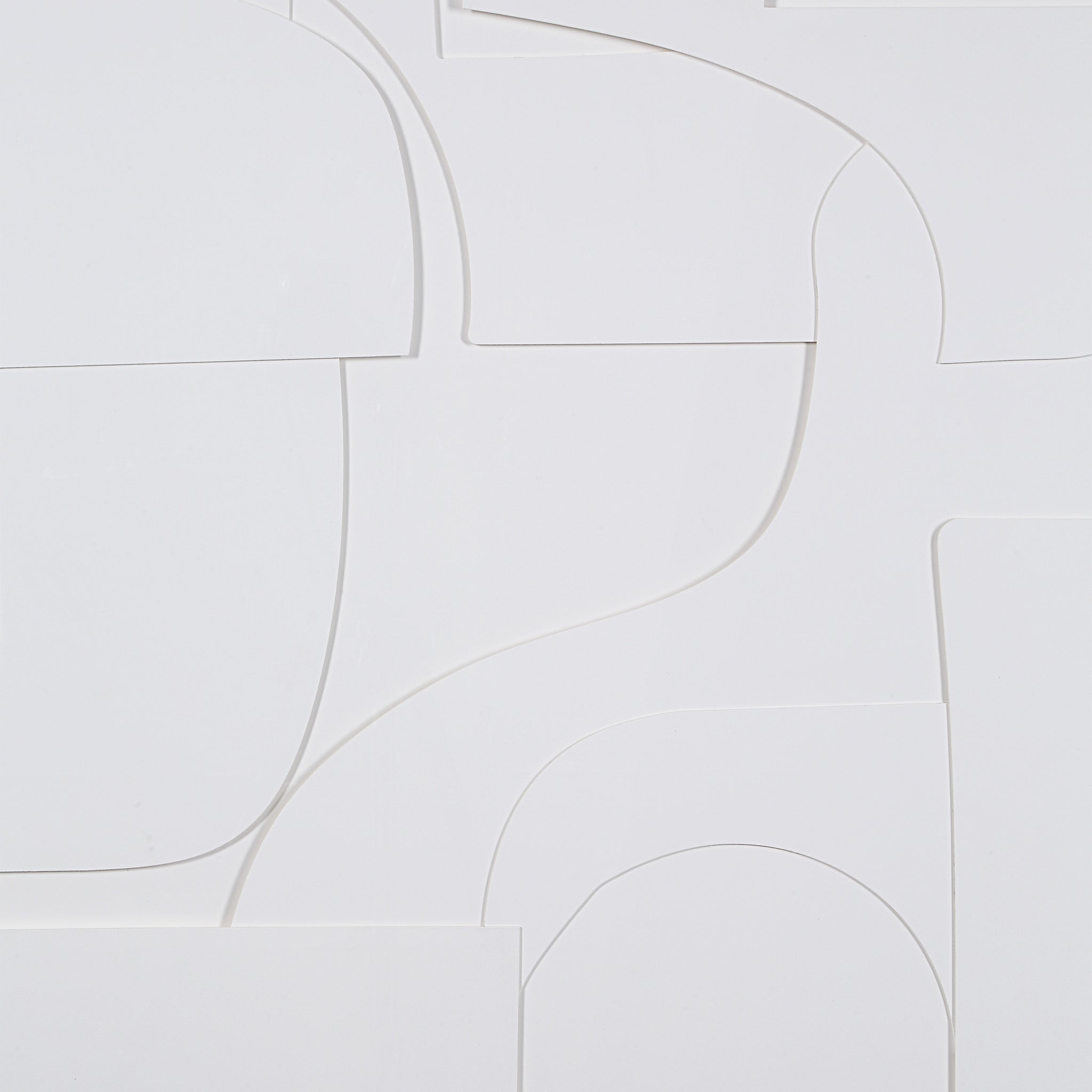 Close-up of Stardust wall art with intricate white abstract shapes on a white background.