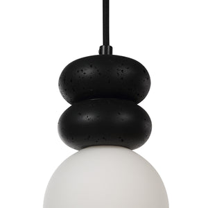 Solene lighting with a black textured top and white glass bottom, modern design.