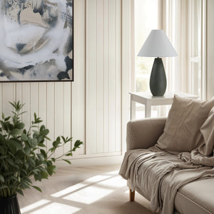 Olso Table Lamp on a white side table in a bright living room setting