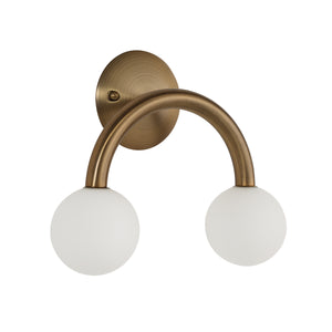 Santi wall sconce featuring two frosted glass globes on a bronze arch