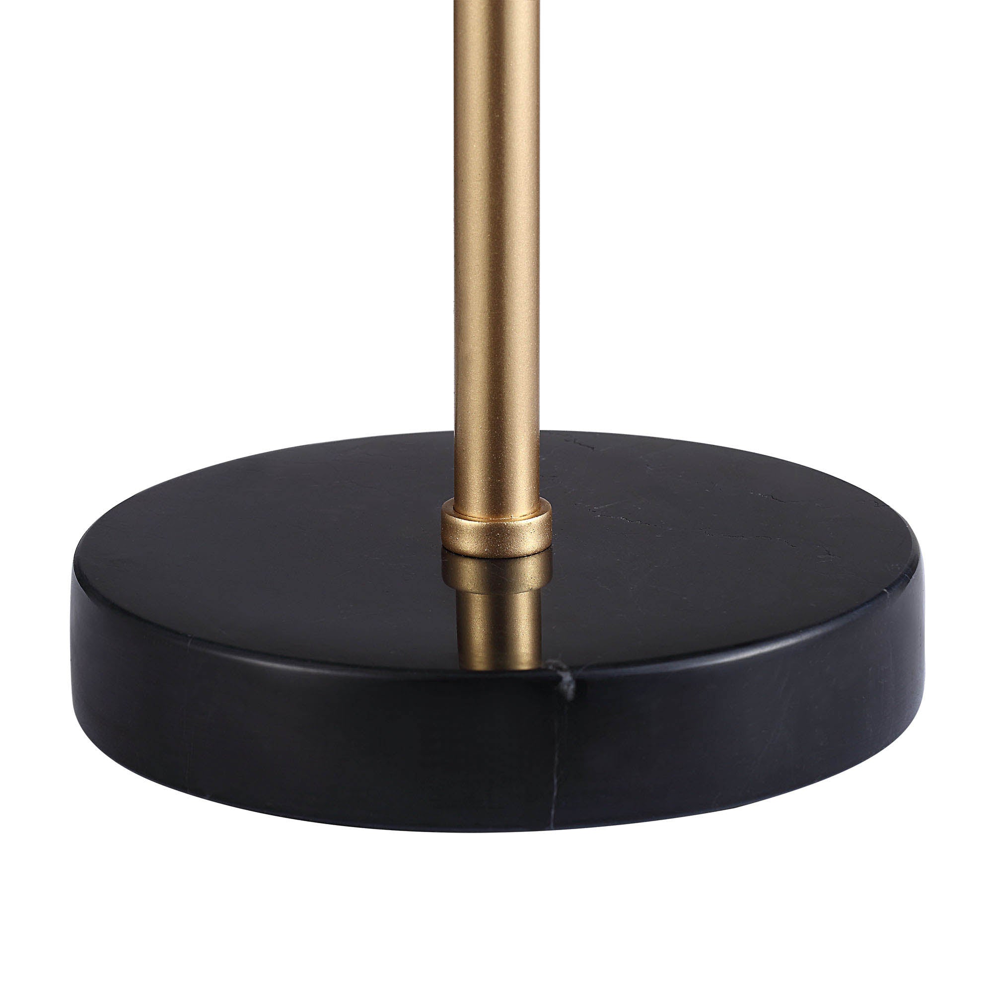 Close-up of Gillian Table Lamp's black base and gold stem.
