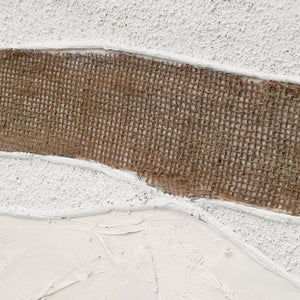 Close-up of Muralis canvas art highlighting the textured brown and white stripes.