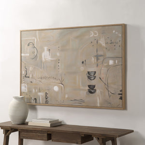 Kore Canvas Art displayed on a wall above a wooden table with a vase and books