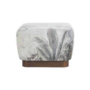Tangle Ottoman featuring a floral design, shown from a front angle with a wooden base.
