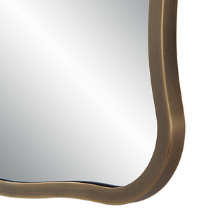 Close-up of Basel Wall Mirror's bronze frame highlighting its wavy design.
