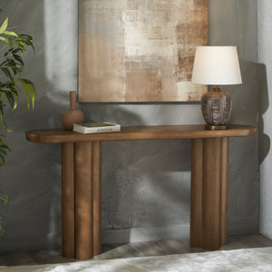 Ramona Console Table styled in a room with decor, lamp, and artwork