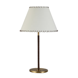 Camelia Table Lamp with white shade and brown woven base, featuring a gold metal stand.