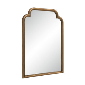 Emilien mirror featuring a gold-toned frame with an arched design, angled view.