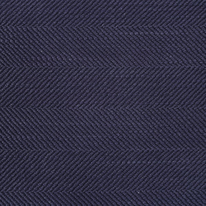 Close-up of Forester decorative pillow showcasing the dark navy herringbone texture.