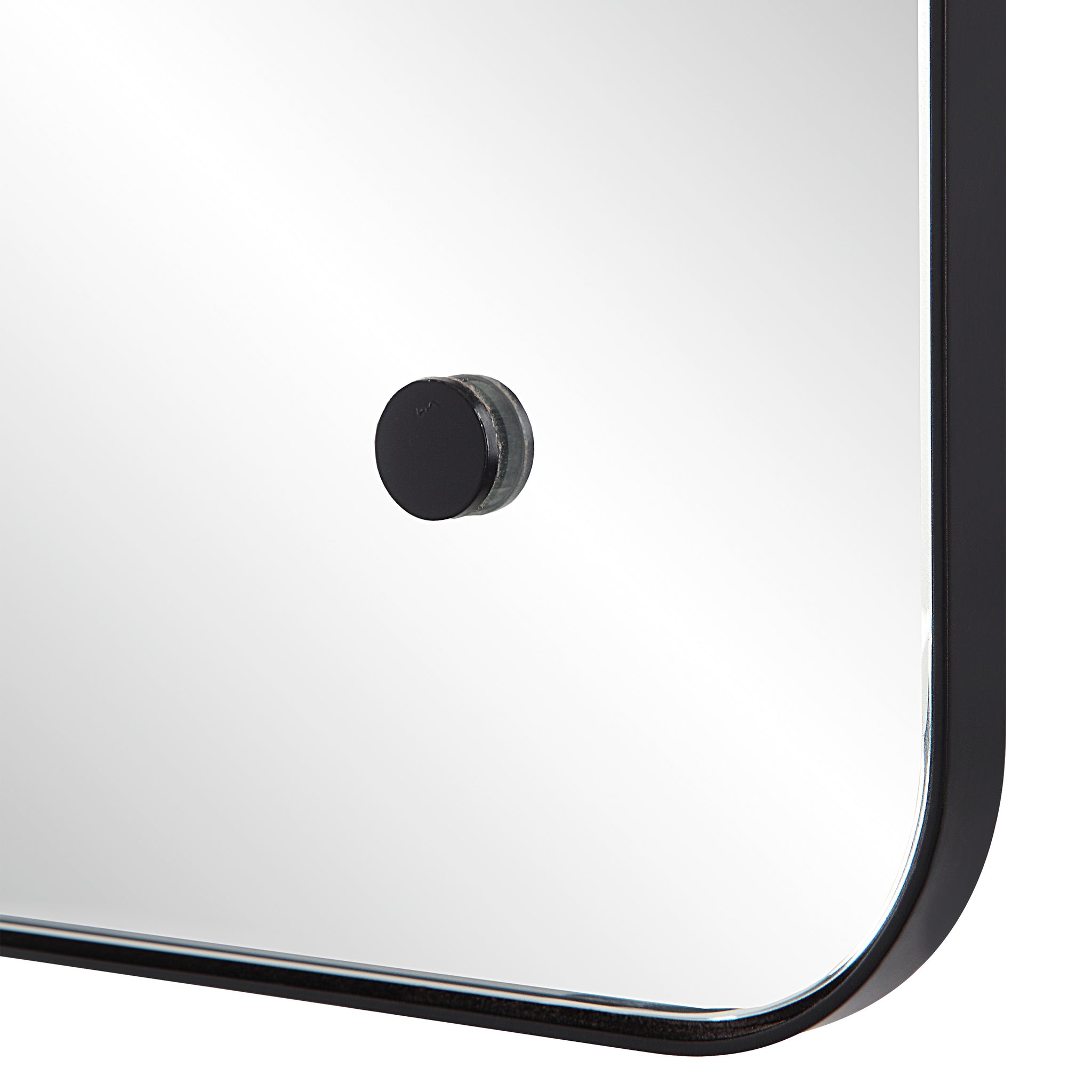 Close-up of Aine Wall Mirror's black mounting hardware and rounded edges.